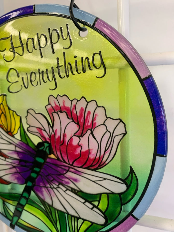 "HAPPY EVERYTHING" ROUND GLASS DRAGONFLY WINDOW DECOR.