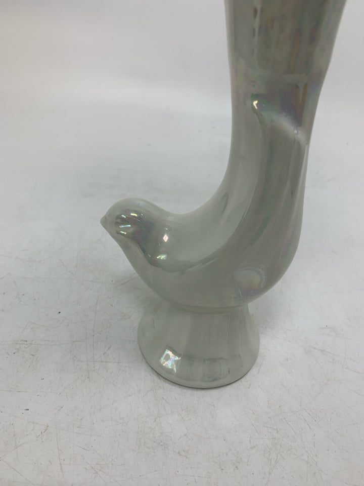 IRIDESCENT BIRD SHAPED VASE W/ FAUX GREENS.