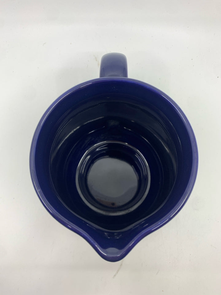 BLUE POTTERY STAMPED PITCHER.