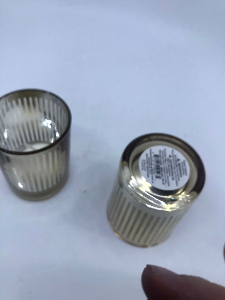 2 STRIPED MERCURY GLASS VOTIVE HOLDERS.