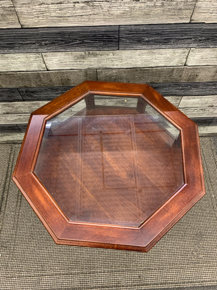 BUTLER HEXAGON SHAPED DARK WOOD DISPLAY TABLE.