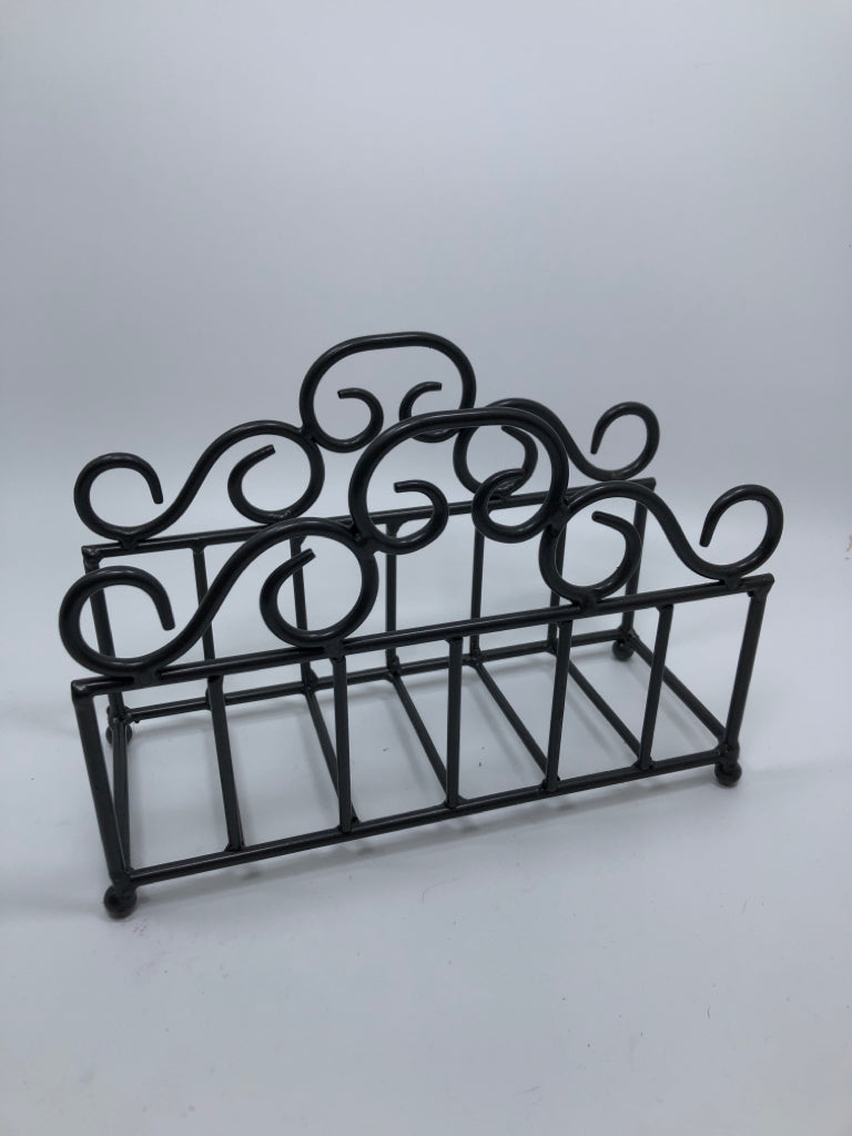 METAL SCROLL NAPKIN HOLDER.