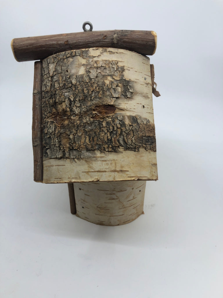 LOG AND TREE BARK BIRDHOUSE.