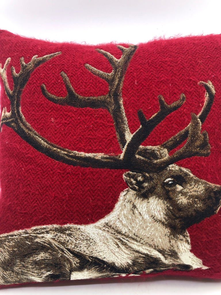 RED REINDEER PILLOW.