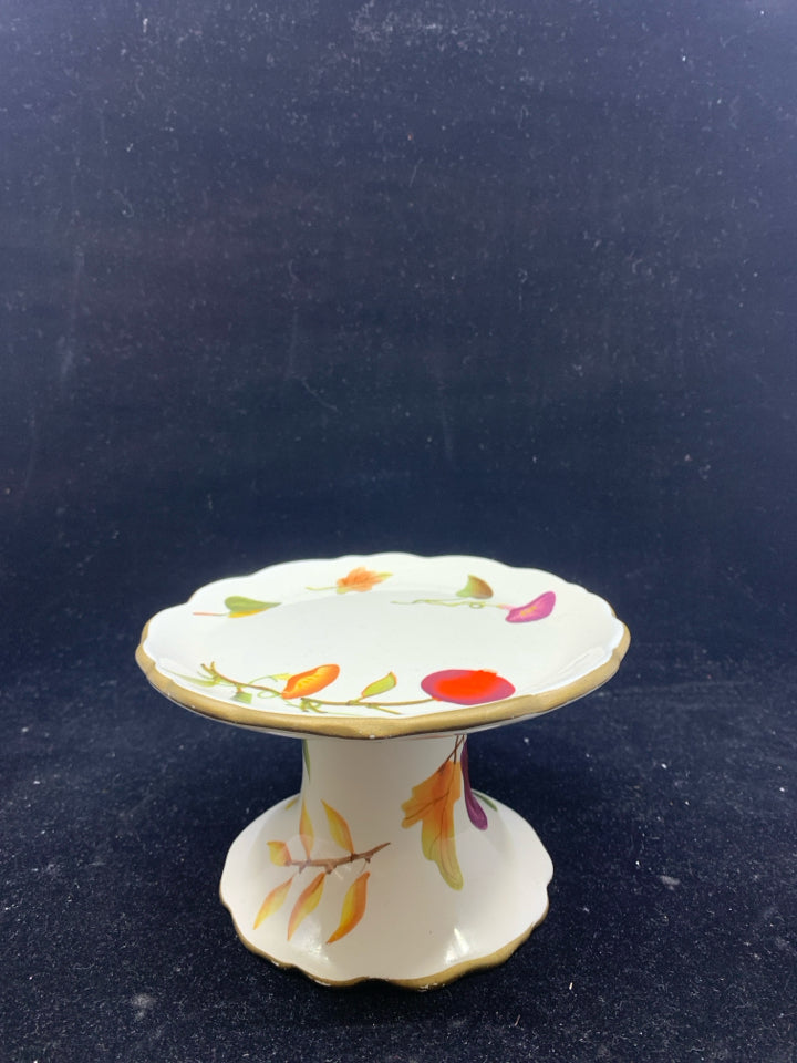 FOOTED FLORAL JAR CANDLE STAND.