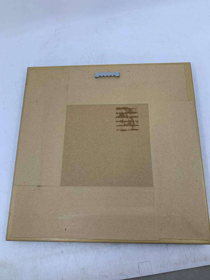 BLACK COFFEE IN DARK FRAME.