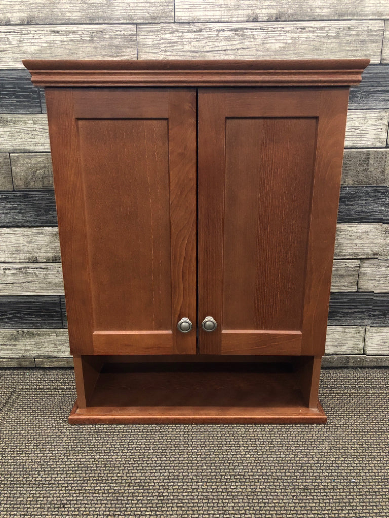 BROWN WOOD BATHROOM WALL CABINET W/ LOWER DRAWER.