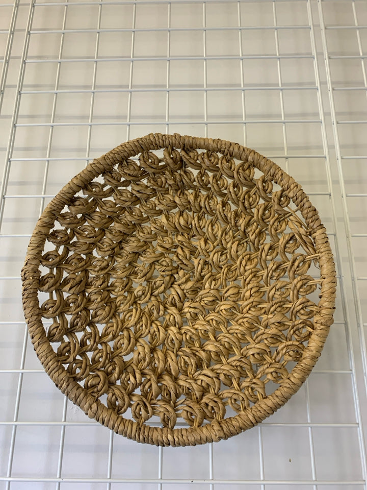 WOVEN CIRCLE BASKET WALL ART.