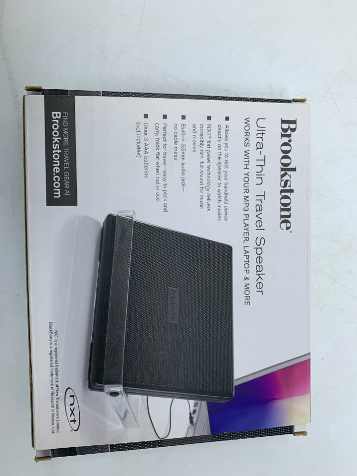 NIB ULTRA-THIN TRAVEL SPEAKER.