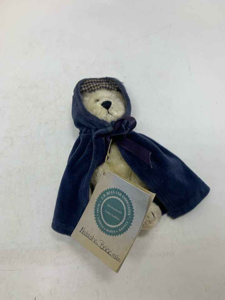 SMALL WHITE BOYDS BEAR W/ NAVY CLOAK.