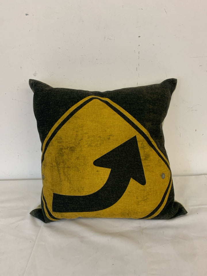 YELLOW TURN SIGN PILLOW.