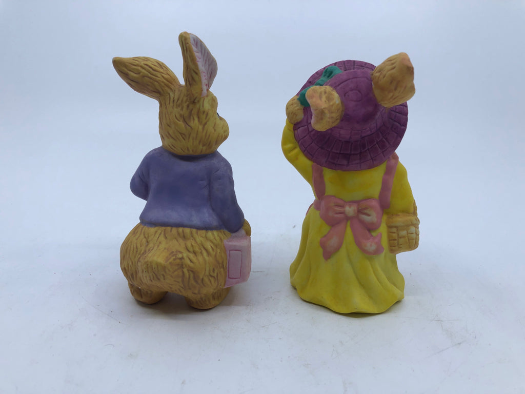 2PC BUNNY COUPLE W/YELLOW DRESS AND BRIEFCASE.