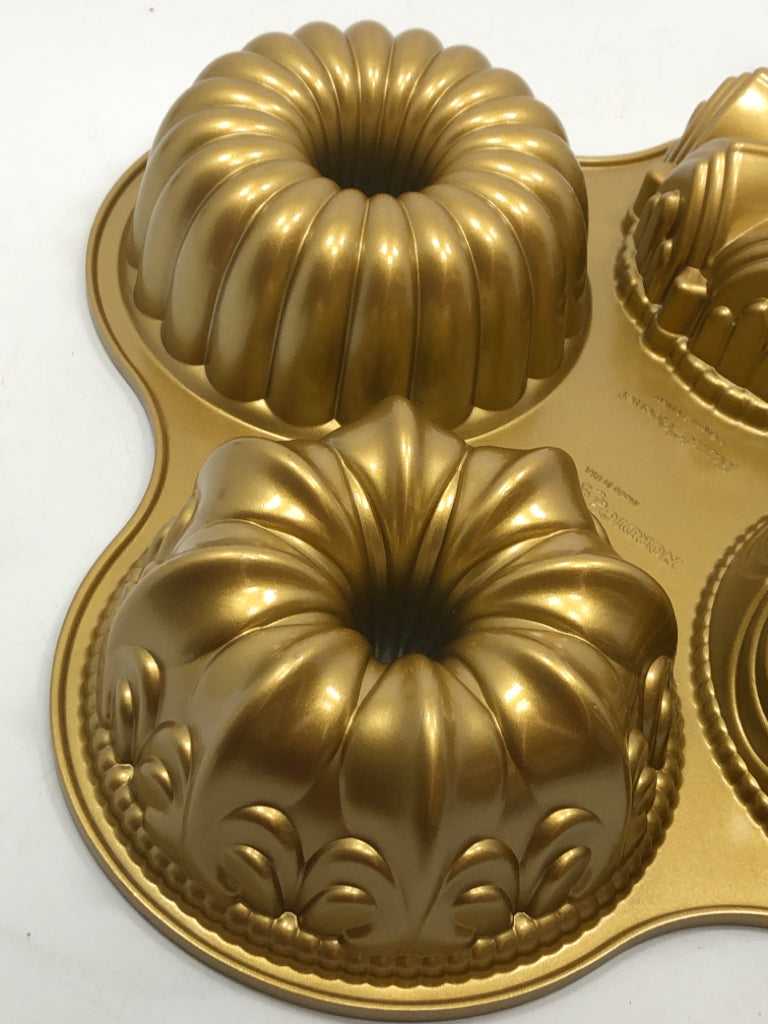 4 CAVITY BUNDT QUARTET CAST ALUMINUM.