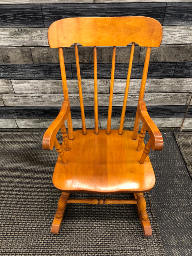 TAN CHILDRENS ROCKING CHAIR.