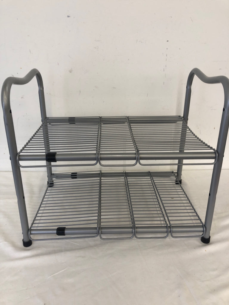 SMALL SILVER METAL SHOE RACK.