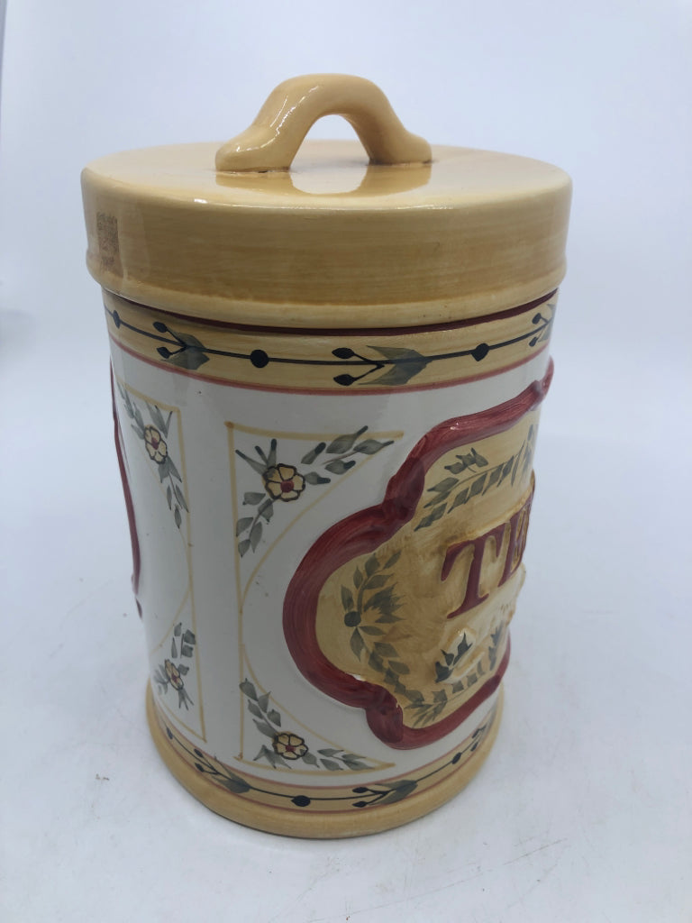 TEA CERAMIC CANISTER YELLOW+ RED FLORAL DESIGN.