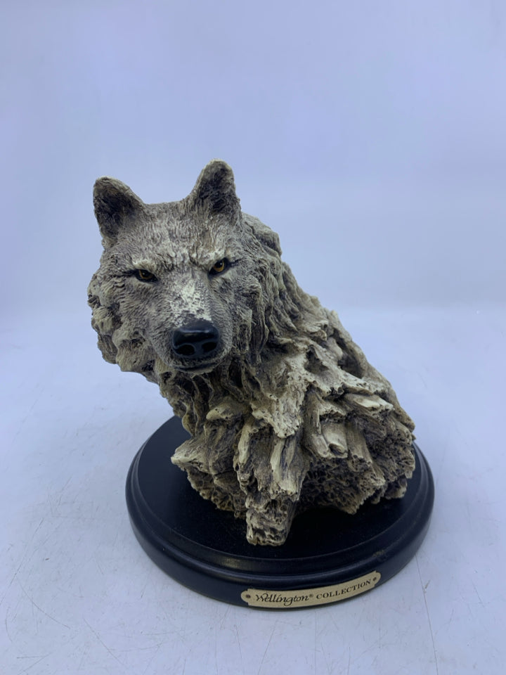 LIGHT WEIGHT WOLF HEAD ON STAND.