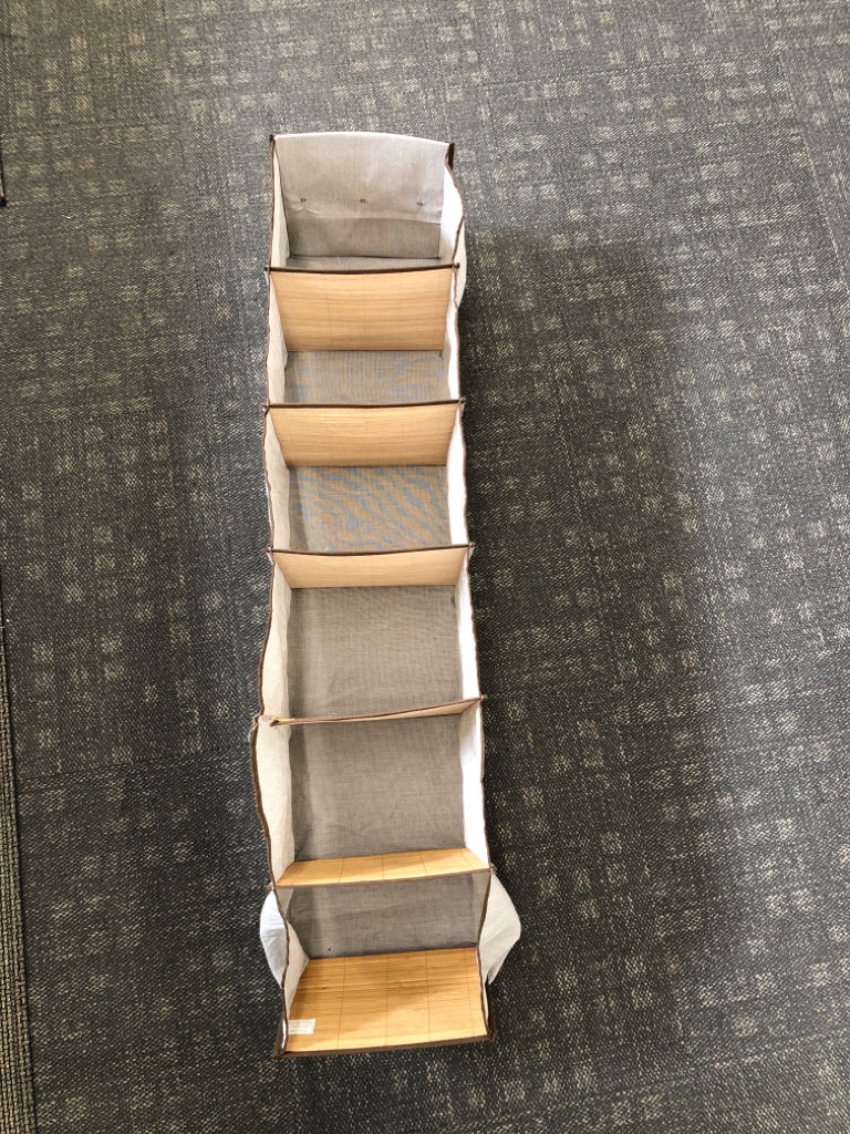 GRAY FABRIC CLOSET ORGANIZER W/BAMBOO DIVIDERS.