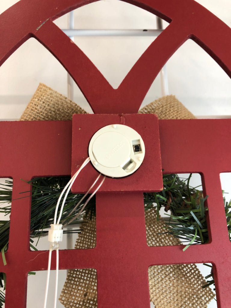 DOOR PANEL W/LIGHT-UP WREATH HANGING.