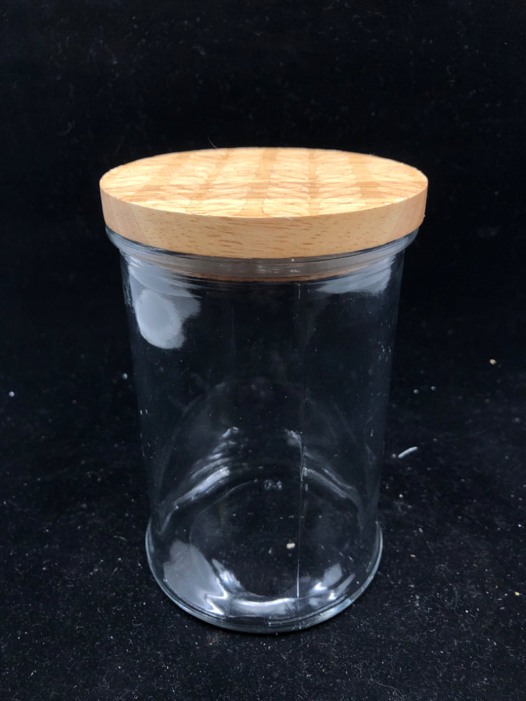 HEAVY GLASS CANISTER W/ TEXTURED WOOD TOP.