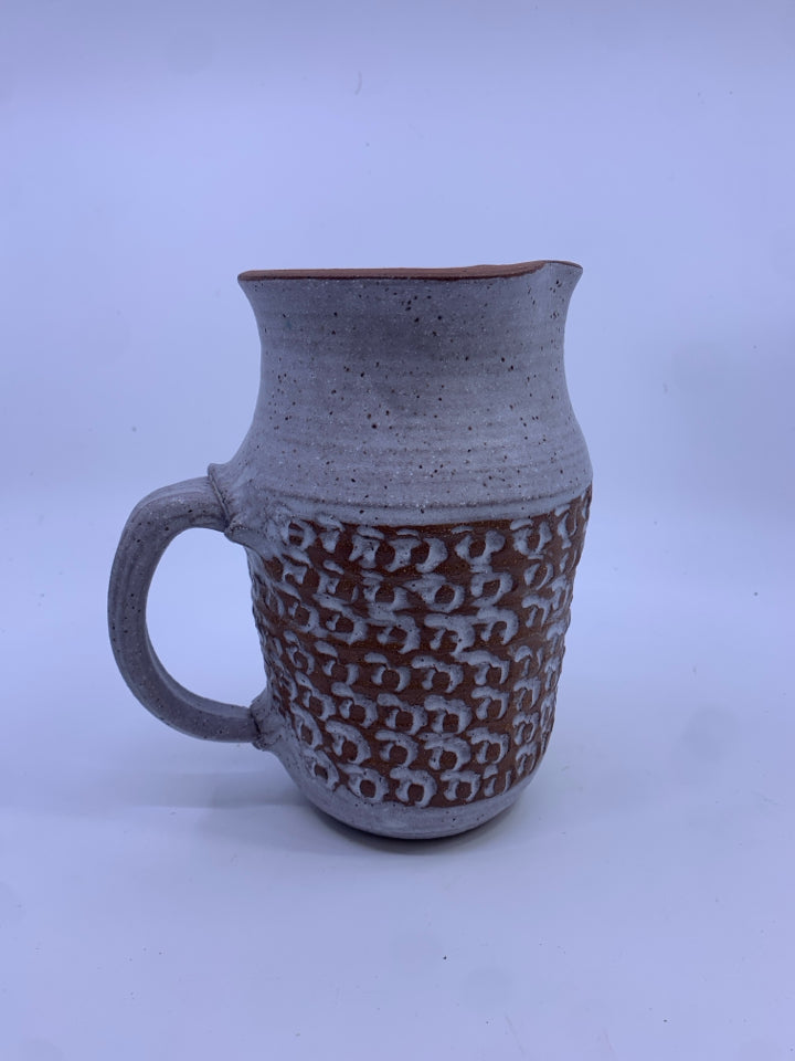 GRAY POTTERY - EMBOSSED DETAILS.