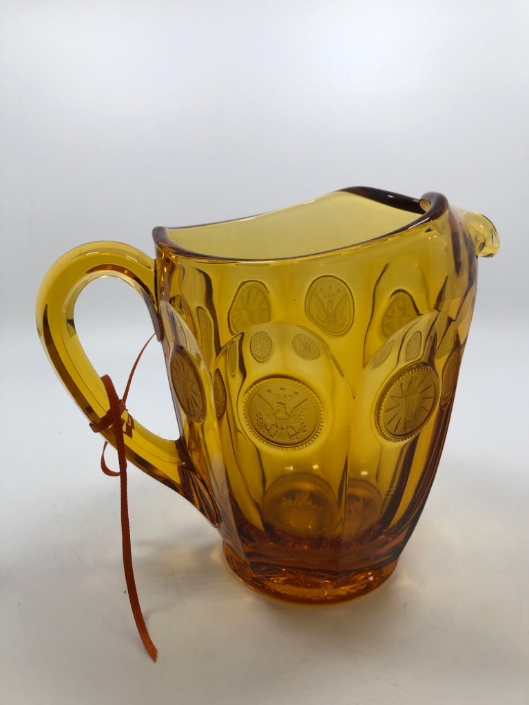 VTG AMBER GLASS PITCHER.