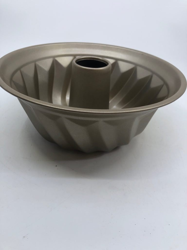 GOLD BUNDT PAN.