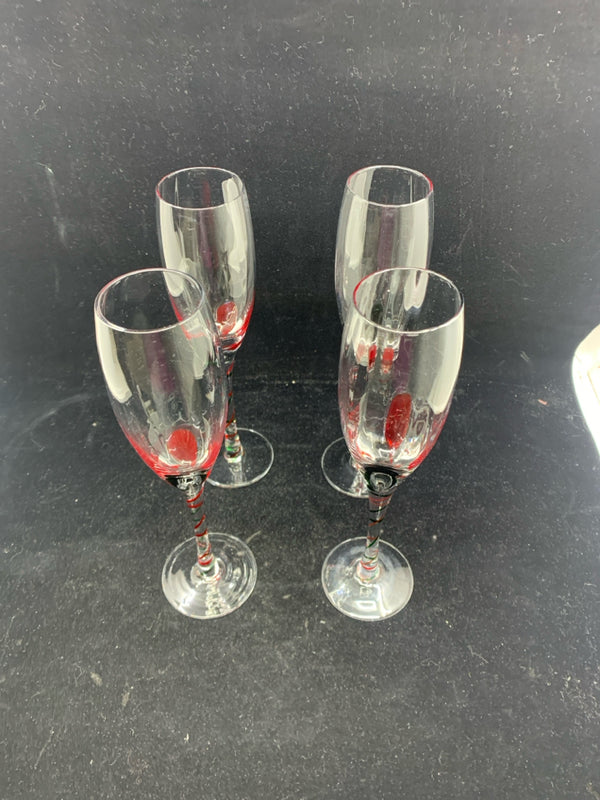 4 GLASS CHAMPAGNE FLUTES W/ RED+GREEN SWIRL DESIGN.