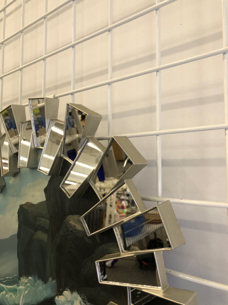 SEAGULL W/WAVES OIL PAINTING IN CIRCULAR REFLECTIVE FRAME.