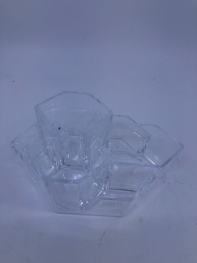 CLEAR PLASTIC MAKEUP/BRUSH HOLDER.