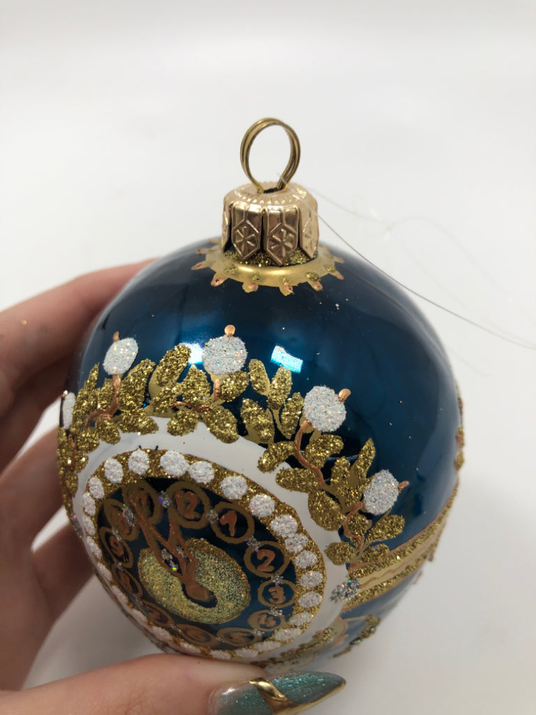 BLUE & GOLD EGG SHAPED ORNAMENT.