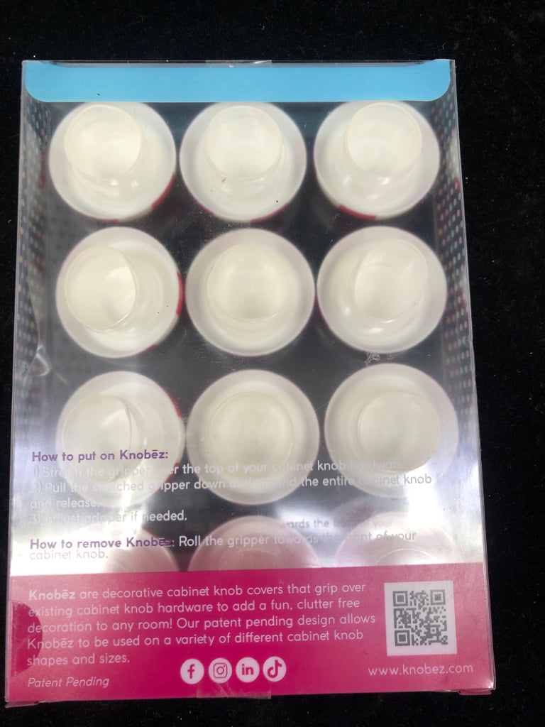 NIB CANDY CANE KNOB COVERS.