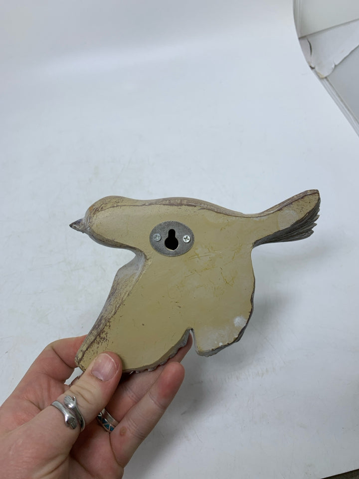 DISTRESSED FLYING BIRD W/ WINGS DOWN.