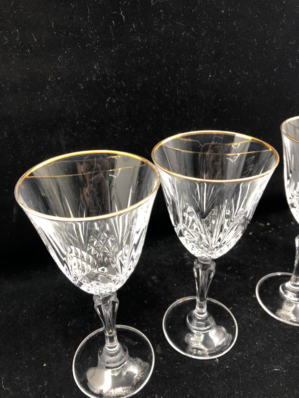 4 CUT GLASS WINE GLASSES W GOLD RIM.