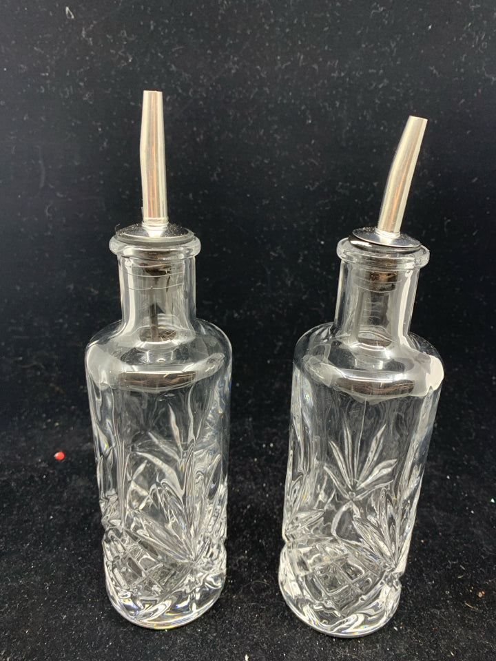 2 CUT GLASS OIL/VINEGAR DISPENSERS.