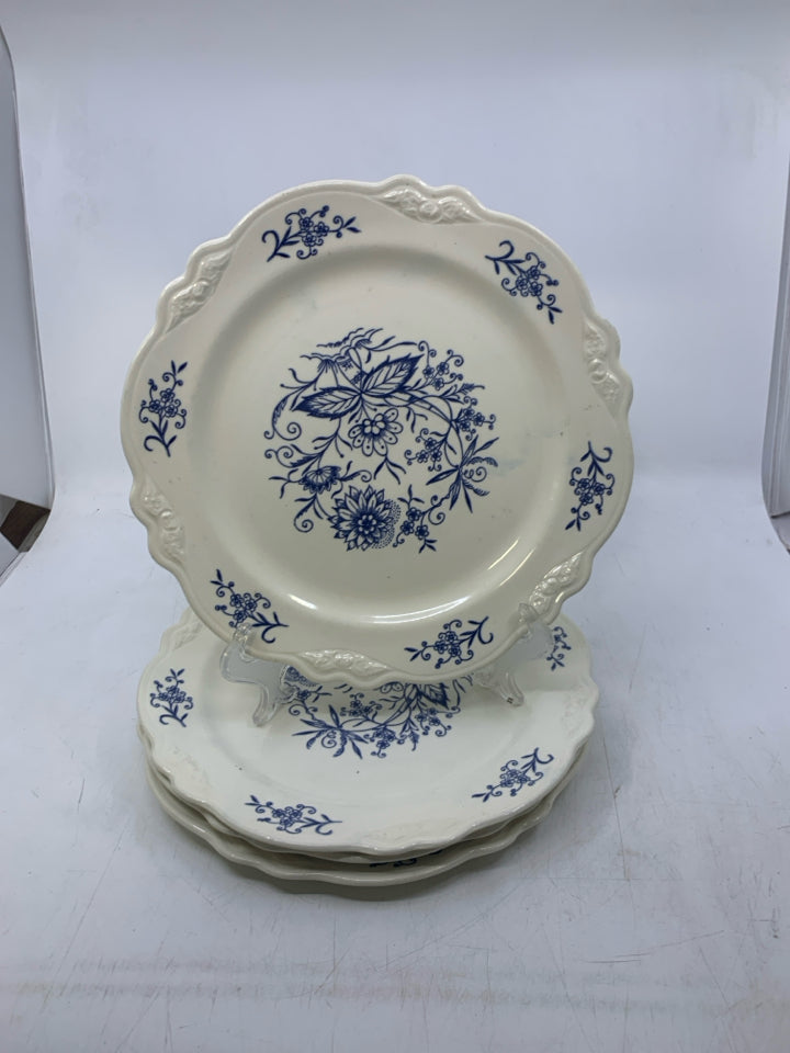 4 WHITE W/ BLUE FLOWERS DINNER PLATES.