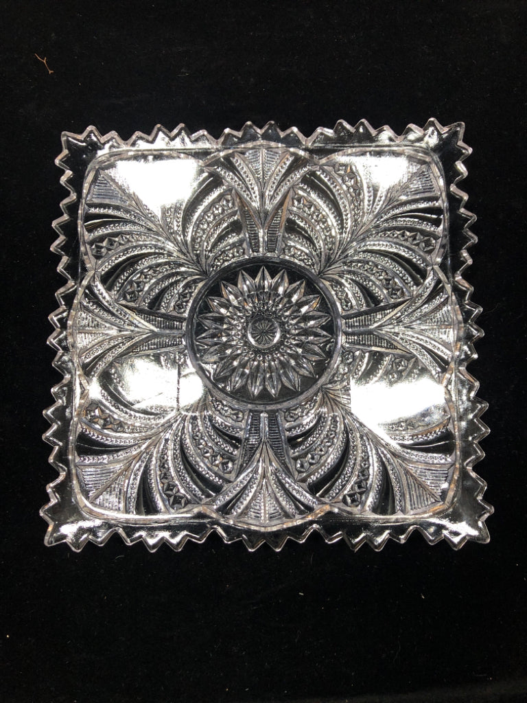 CLEAR GLASS EMBOSSED SUN BURST PLATE.