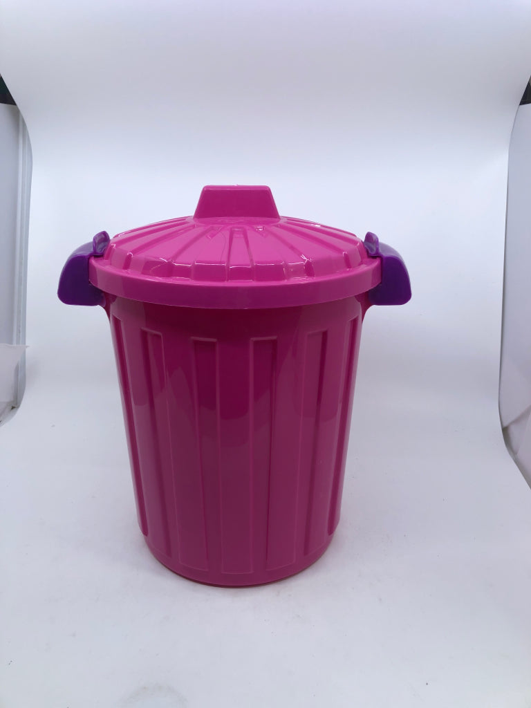 PINK AND PURPLE COVERED TRASH BARREL.