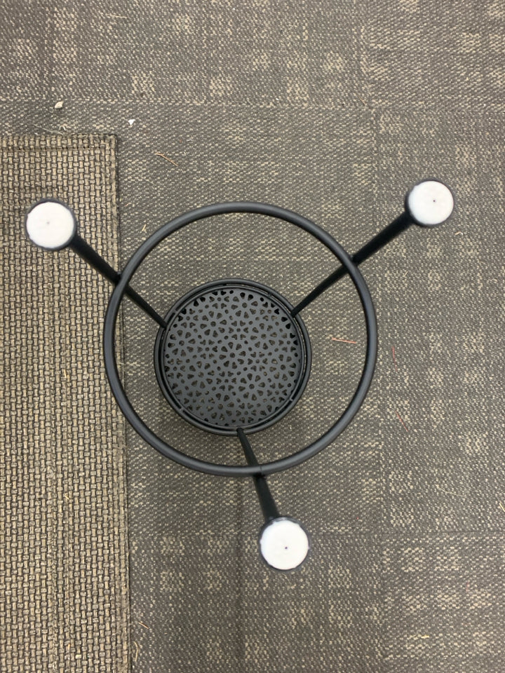 BLACK METAL PLANT STAND FLOWER PIERCED BASE.