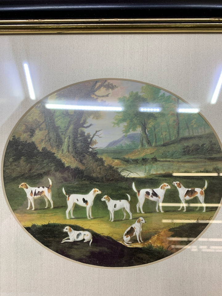 VTG DOG ARTWORK W/7 WHITE SPOTTED DOGS IN BLACK & GOLD FRAME.