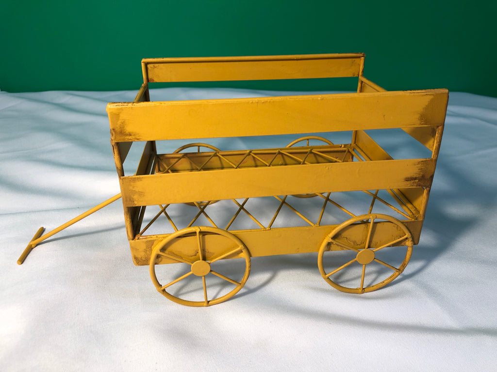 PALE ORANGE METAL WAGON.