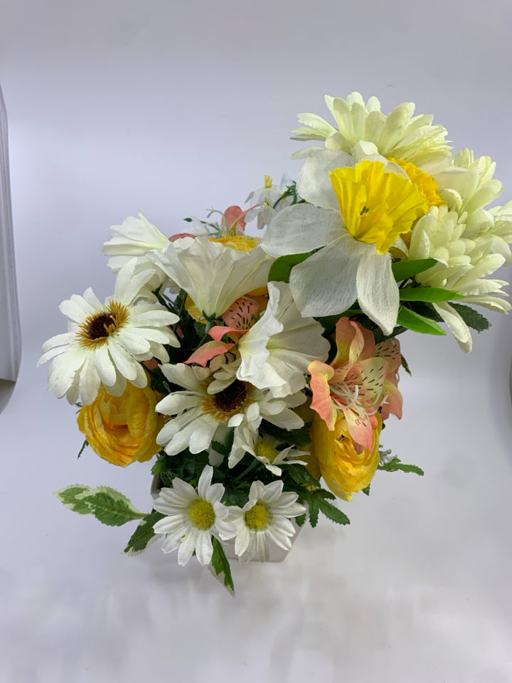 PINK & YELLOW FLORALS IN WHITE SQUARE POT.