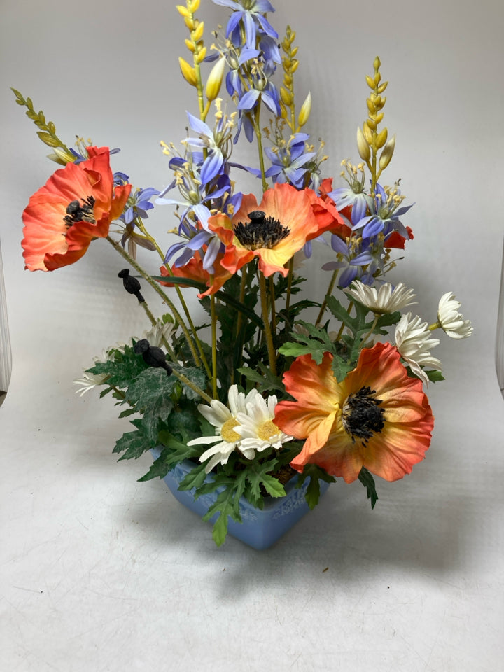 BLUE PLANTER W/ ASSORTED WILD FLOWERS.