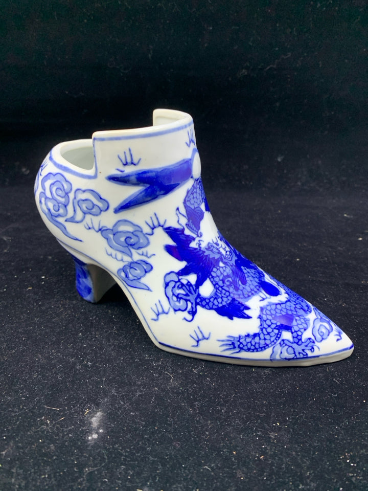 BLUE AND WHITE SHOE PLANTER.