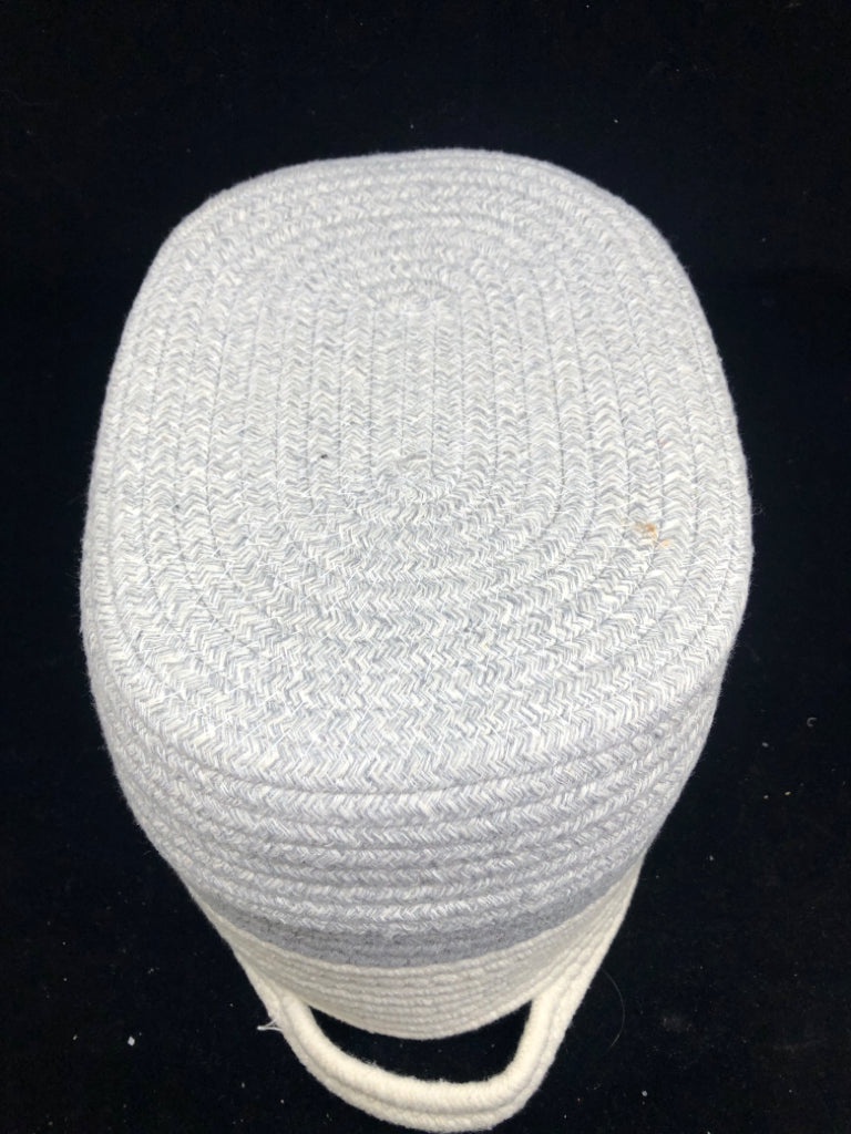 GREY AND WHITE WOVEN BASKET W HANDLES.