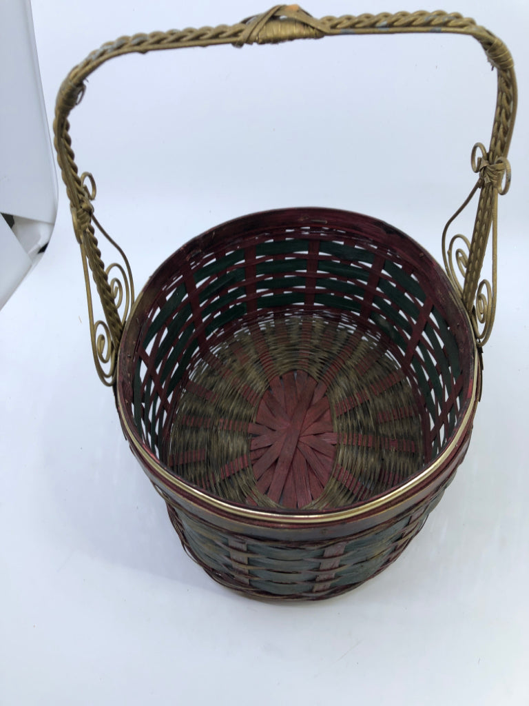 MAROON/GREEN BASKET WITH GOLD METAL HANDLE & LEAF.