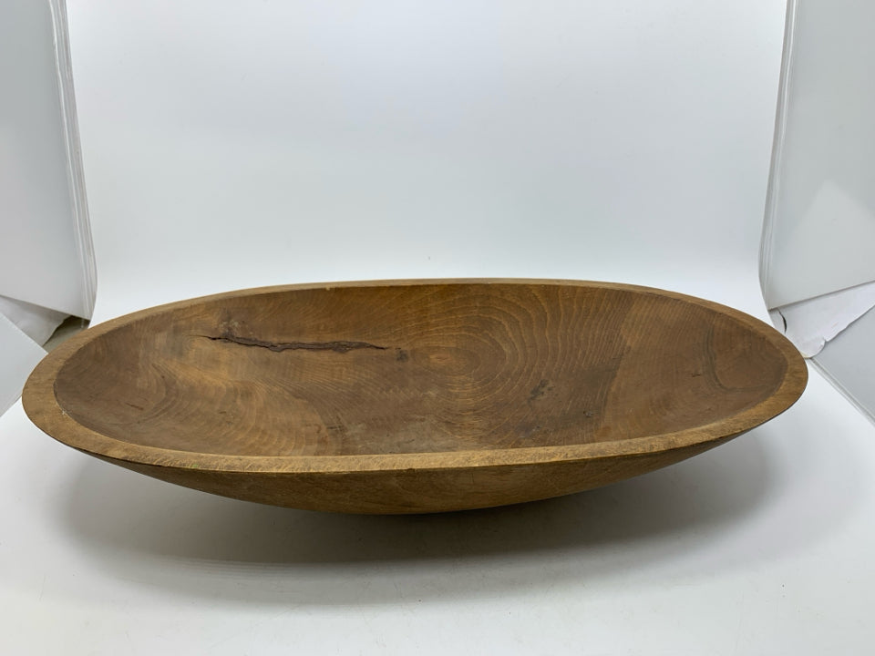 RUSTIC OVAL DARK WOOD CARVED BOWL.