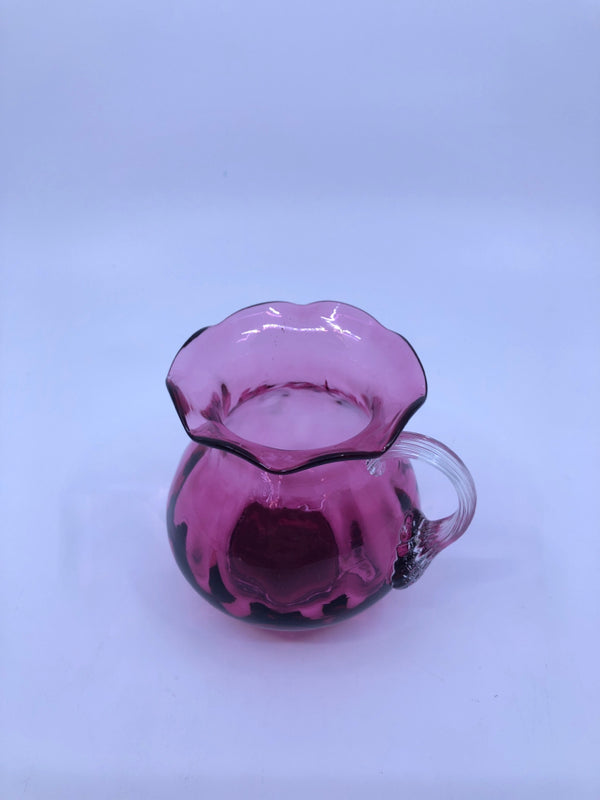 PINK BLOWN GLASS PITCHER W/ FLARED TOP.