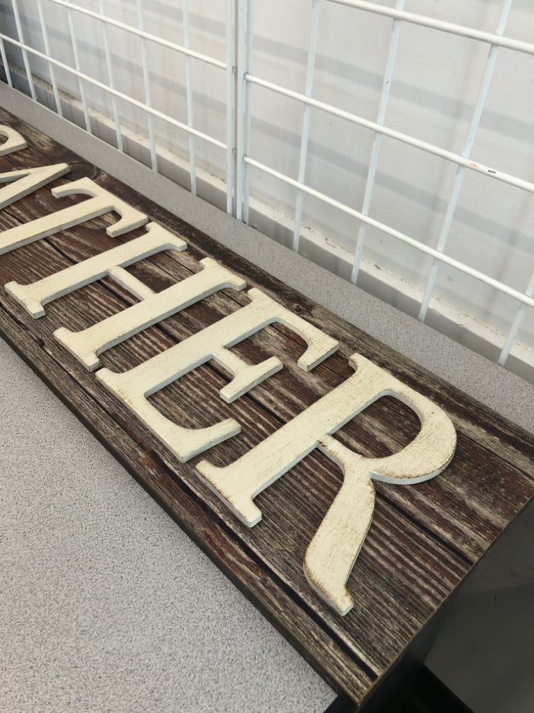 GATHER SIGN ON WOOD WALL HANGING.