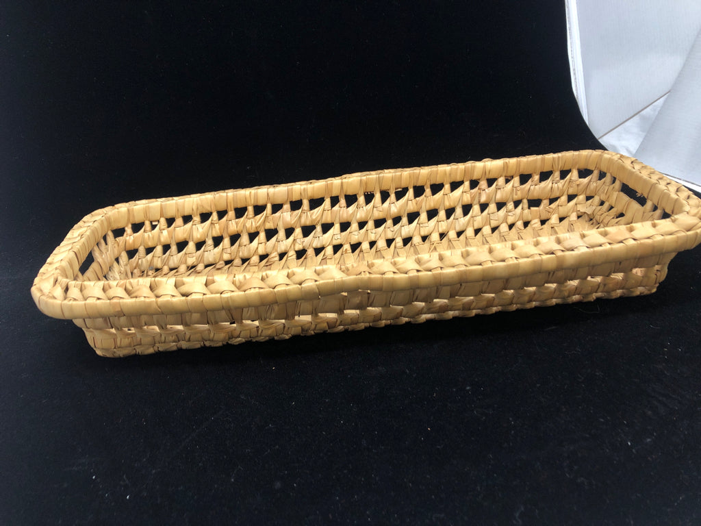 RECTANGULAR HAND WOVEN OPEN WEAVE BASKET.